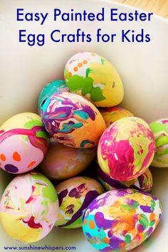 painted easter eggs in a white bowl with the words easy painted easter egg crafts for kids