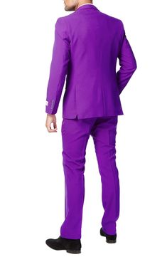 Watch your friends grimace and turn green with envy when you stride into the room sporting a regal purple suit featuring a slim, two-button jacket, sharply creased flat-front trousers and a matching to tie that pulls the whole look together. Jacket has a two-button closure, notch lapels; nonfunctional four-button cuffs; chest pocket; front flap pockets; side vents. Trousers have a zip fly with button-tab closure; front slant pockets; back welt pockets. Fully lined. 100% polyester. Dry clean or m Tailored Purple Set For Party, Tailored Purple Party Sets, Lavender Fitted Sets For Formal Occasions, Tailored Purple Suit With Notch Lapel, Purple Tailored Suit With Notch Lapel, Purple Notch Lapel Suit For Party, Tailored Purple Suit For Party, Tailored Purple Party Suit, Business Sets With Notch Lapel In Purple