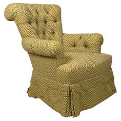 an upholstered chair with buttons on the back