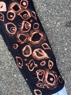 the leggings are decorated with an artistic design