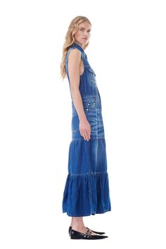 Meet the ultimate blend of casual and chic with the Ganni Denim Dress. Featuring a structured fit with bold seaming details and classic button-down front, it's perfect for any laid-back occasion. Denim Long Dress, Sleeveless Denim Dress, Flounce Skirt, Dreamy Dress, Lilac Dress, Mid Dresses, Blue Vintage, Mini Wrap Dress, Printed Midi Dress