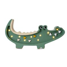 a green alligator with lights on it's head