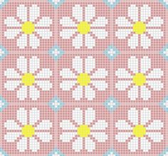 a cross stitch pattern in pink and blue, with yellow stars on the middle of it