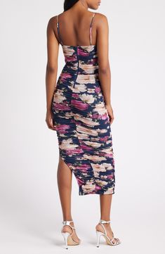 Rows of ruching shape the close-fitting silhouette of this sweet and sultry dress covered in blooms and hung from slim straps. Square neck Spaghetti straps Lined 96% polyester, 4% spandex Hand wash, line dry Imported Purple Floral Print Dress With Sweetheart Neckline, Purple Floral Print Dress With Fitted Bodice, Strapless Floral Print Bodycon Dress, Floral Print Strapless Bodycon Dress, Strapless Floral Print Fitted Bodycon Dress, Strapless Fitted Floral Print Bodycon Dress, Strapless Floral Bodycon Dress, Fitted Sleeveless Ruched Floral Dress, Fitted Strapless Floral Print Dress