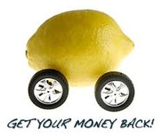 a lemon with wheels and the words get your money back