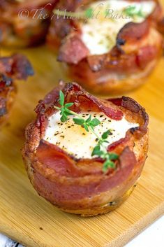 bacon and egg cups on a cutting board