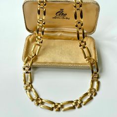 Stunning vintage 1970s 18ct gold plated chain link necklace...with lovely 'gate' style gold plated links, all in splendid condition and measuring 42.5c in length x 1cm in depth + Packaging I wrap and pack my jewellery in pretty boxes - perfect for gifts. + Shipping All items are shipped next day using Royal Mail first class signed for in the UK. + Returns Please contact me within 7 working days of receiving your item if you wish to return it. * Perfect choose as Christmas Gift , Valentine's Day Elegant Hallmarked Link Chain Necklace, Gold Necklaces With Rectangular Links For Anniversary, Formal Gold-plated Chain Necklace With Rectangular Links, Gold Plated Link Chain Necklace For Anniversary, Vintage Gold Hallmarked Chain Necklace, Vintage Jewelry With Box Chain Link, Vintage Yellow Gold Necklaces With Rectangular Links, Vintage Gold-tone Oval Link Necklace, Hallmarked Gold Plated Chain Necklace For Formal Occasions