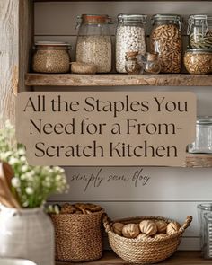 a shelf filled with lots of different types of food in glass jars and baskets next to each other