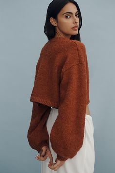 Wrap up your look: THIS is the bow ment. Boasting a bouclé knit, this cardigan is complete with balloon sleeves and a plunging open neckline. | Bouclé Bow-Front Cardigan Sweater by Maeve in Orange, Women's, Polyester/Nylon/Wool at Anthropologie Bow Cardigan, Balloon Sleeve Sweater, Orange Sweater, Warrior Queen, Orange Sweaters, Pull Through, Greek Goddess, 50 Fashion, Balloon Sleeves