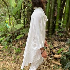 Gorgeous free-flow loose rayon/cotton top for Ceremony, Yogic practice and/our your daily Rituals. This oversized shirt can be worn as a Ceremony or Kundalini white piece as well as a part of a nomadic festival outfit. Designed by our Moroccan friends from LA this piece truly resembles the nomad lifestyle. We fell in love with its comfy feel and are honored to add it to our “Ceremony White” collection of pieces created with intention to support you on your journeys Within and connecting to the H White Relaxed Fit Tops For Festival, Bohemian White Tunic For Loungewear, White Tunic Tops For Festival, White Bohemian Oversized Tops, White Long Sleeve Tunic For Loungewear, White Oversized Bohemian Tops, Oversized White Bohemian Tops, Nomad Lifestyle, Happy To Meet You