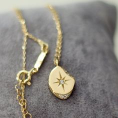 Collection : '' I see lots of stars but none of them is you'' Chain lentgh : 16 in Pendant width : 11mm (0.43 in)  , height : 14mm (0,55 in) Weight for 14K Gold : 3.16gr (approximate) 14K Gold *Fedex Express Shipping 2-7 business days to Worldwide ✦ Registered mail which require a signature ✦ We need your phone number for Fedex/TNT receipts. ✦ We can't send to PO BOX adresses. All of our products are our own designs and are produced in our workshop. These products, which are pure gold, are handcrafted with the purity specified. When you order, you receive beautiful and high-quality jewelery crafted with exquisite craftsmanship and pure gold. Orders are prepared in 2-3 business days and delivered to America, Australia and Europe in 2-5 business days with free shipping. All products reach yo Elegant Gold Necklace With Compass Design, Engraved Star-shaped Yellow Gold Necklace, Engraved Star Yellow Gold Necklace, Yellow Gold Star Charm Necklace For Anniversary, 14k Gold Star Charm Necklace, 14k Gold Star-shaped Necklace For Anniversary, 14k Gold Necklace With Star Charm, 14k Yellow Gold Necklaces With Star Charm, 14k Yellow Gold Necklace With Star Charm