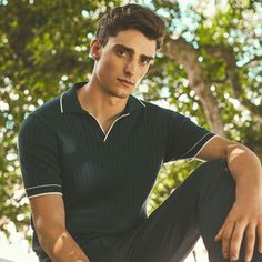 Crafted in a durable blend of cotton and polyester, this rib-stitch short-sleeved polo sweater showcases a solid flat knit Johnny collar, armbands, and waist. Soft against the skin with comfort stretch and added strength for lasting wear, it strikes the perfect balance between comfort and durability. Ribbed Polo Shirt Outfit Men, Fitted Navy Polo Sweater With Ribbed Collar, Navy Short Sleeve Polo Shirt With Ribbed Collar, Navy Short Sleeve Polo Sweater With Ribbed Collar, Fitted Knit Polo Sweater With Short Sleeves, Fitted Ribbed Polo Shirt, Fitted Ribbed Short Sleeve Polo Shirt, Ribbed Cotton Short Sleeve Polo Shirt, Casual Short Sleeve Polo Sweater With Ribbed Neckline