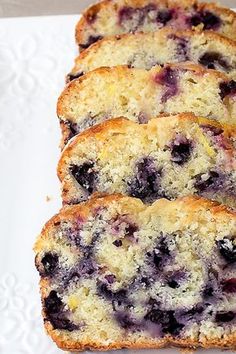 slices of blueberry muffins on a white plate