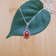 "Visit our on-line shop at: Etsy.com/shop/AlbuquerqueDesigns *sterling silver necklace pendant *Small pendant with silver box chain necklace 18\" *southwestern jewelry *carnelian / healing carnelian *calibrated pre-cut stones: 9x7mm oval shape *back of jewelry items are all covered / do not show the back of stones *all jewelry items are made to ship, slight variations in stones will occur comparing to pictures. *size of a penny is 19mm or a dime is 18mm in diameter for comparing size with jewelr Silver Carnelian Cabochon Necklace, Carnelian Oval Pendant Necklace As A Gift, Carnelian Oval Pendant Necklace For Gift, Stamped 925 Carnelian Jewelry, Carnelian Necklace, Box Chain Necklace, Southwestern Jewelry, Line Shopping, Silver Box