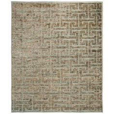 an area rug with brown and green squares on the side, in front of a white background