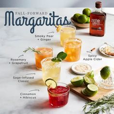 the ingredients for margaritas are displayed on a table