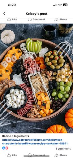 a bowl filled with lots of food on top of a table