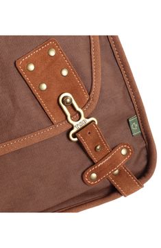 With a stylish design that can be carried by men and women, this flap bag offers plenty of slots to organize all of your essentials when traveling through town. 14"W x 12"H x 5"D; 24" strap drop Textile/leather Imported Brown Waxed Canvas Briefcase With Luggage Sleeve, Functional Brown Satchel For Travel, Functional Brown Travel Satchel, Casual Brown Laptop Bag For Travel, Casual Brown Travel Laptop Bag, Brown Rectangular Shoulder Bag With Anti-theft Pocket, Brown Crossbody Briefcase With Zipper Pocket, Brown Travel Satchel With Zipper Pocket, Brown Satchel Laptop Bag For Outdoor