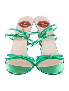 #GUCCI | From the Spring/Summer 2017 Collection. Metallic green leather Gucci crisscross sandals with bow accents at vamps, covered heels featuring antiqued gold-tone snake adornments and buckle closures at ankles. Includes box, dust bag and additional heel taps. Gucci 2017, Sandals With Bow, Heel Taps, Heel Tap, Criss Cross Sandals, Clothing Pieces, Aesthetic Indie, Shoe Inspo, Metallic Sandals