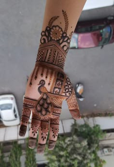 a henna tattoo on someone's hand