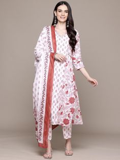 Women Floral Printed Pure Cotton Kurta with Trousers & Dupatta PRODUCT DETAILS  Off white printed Kurta with Trousers with dupatta Kurta design: Floral printed Straight shape Regular style V-neck, three-quarter regular sleeves 1 pockets Calf length with straight hem Pure cotton machine weave fabric Trousers design: Printed Trousers Partially elasticated waistband Slip-on closure Size & Fit The model (height 5'8) is wearing a size S Material & Care Top fabric: Pure Cotton Bottom fabric: Pure Cott Anarkali White Pant Set For Festive Occasions, Traditional Pant Set With Printed Motifs For Wedding, White Floral Print Dupatta For Navratri, Traditional Wedding Pant Set With Printed Motifs, Festive White Pant Set For Wedding, White Anarkali Pant Set, Festive Printed Saree Set, Festive Anarkali Printed Sets, Festive Anarkali Set With Print