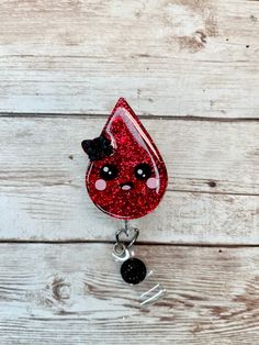 Red glitter blood drop badge reel with bow. All badge reels are handmade and may contain small flaws including, but not limited to, minor bumps, bubbles, and/or misplaced glitter. Colors of the actual item may vary to what is shown on the screen due to differences in digital devices. I do my best to reach as close to perfection as possible before the item is shipped to you. All items are made to order in the sequence that I receive them. My current turn around time for badge reels is 2-3 weeks b Phlebotomy Badge, Blood Drop, Clay Things, Glitter Colors, Phlebotomy, Digital Devices, Nurse Badge Reel, Nurse Badge, Red Glitter