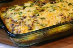 a casserole dish with mushrooms and cheese