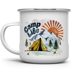 a camp like mug with mountains and trees in the background