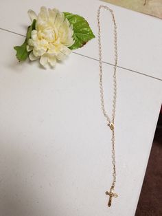 "Beautiful Vintage Rosary, new never been used in original clear box. Makes a perfect gift for Catholic Wedding couple, First Communion, Confirmation, Birthday. Dementions: Decades length: 22\" Complete folded rosary as shown laying on table including crucifix: 16 1/4\" Crucifix: 1 1/4\" x 5/8\" FINAL SALE, NO RETURNS, NO EXCHANGES, PLEASE CONTACT FOR ANY QUESTIONS OR CONCERNS AFTER LOOKING AT ALL THE PICTURES." Delicate Gold Rosary Bracelet Gift, Elegant Rosary Bracelet With Miraculous Medal Gift, Elegant Rosary Bracelet With Miraculous Medal, Gold Beaded Crucifix Rosary, Gold Rosary With Beaded Chain, Gold Rosary With Beaded Chain As Gift, Elegant Beaded Chain Rosary For Gift, Elegant Gold Rosary For Gift, Elegant Beaded Chain Rosary As Gift