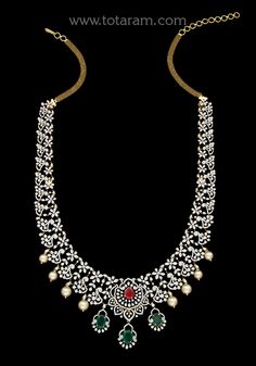 18 karat gold 'detachable / 5 in 1' diamond long necklace with color stones & culture pearls
  this product has inter changeable stones in the necklace and pendant.
  this product has a detachable pendant which can be used as a separate pendant with most chains.
  it can also be used as a short necklace


enhance your beauty with 18 karat gold diamond long necklace from india  indulge in luxury with our exquisite 18 karat gold 'detachable / 5 in 1' diamond long necklace with color stones & cultu Traditional Diamond Necklace With Single Cut Diamonds For Celebration, Diamond Necklace For Receptions And Festivals, Diamond Necklace For Reception And Festivals, Festival Diamond Necklace For Receptions, Festival Reception Diamond Necklace, Diamond Necklaces For Celebrations And Festivals, Festive Temple Jewelry Style Diamond Necklace, Temple Jewelry Diamond Necklace With Single Cut Diamonds, Traditional Diamond Necklace With Single Cut Diamonds