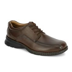 A true classic in mens fashion, these casual dress shoes are made with genuine full grain leather uppers and complete with the traditional oxford silhouette. Inside these mens shoes youll find Dockers All Motion Comfort technology designed to provide all day comfort and encourage good foot health. The cushioned footbed will keep your feet relaxed, while the durable rubber outsole adds exceptional support. Perfect for any dress occasion, these oxfords pair well with dress pants, slacks, or khakis Casual Oxford Shoes, Oxford Shoe, Rugged Leather, Tan Shoes, Brown Loafers, Dress Occasion, Casual Dress Shoes, Oxford Dress Shoes, Oxford Shoes Men