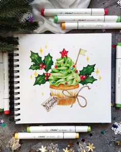 a drawing of a christmas tree in a cupcake