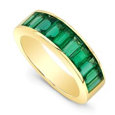 Alexandra Jules' handcrafted 'Classic Emerald Baguette Band' is the brand's ambassador. The 18-karat gold band is set with 3.5-carats of emeralds. Gift it on a landmark birthday and it's sure to become her favorite piece. Perfect for every day, yet special enough for evening. Looks divine stacked with additional bands. Baguette Diamond Wedding Band, Baguette Band, Baguette Diamond Band, Baguette Wedding Band, Luxury Gifts For Women, Art Deco Emerald Ring, Emerald Band, Emerald Engagement Ring Cut, Men Diamond Ring