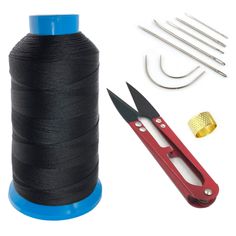 a spool of thread, scissors, and needle on a white background with other sewing supplies