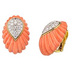 From David Webb, a pair of diamond and fluted coral earrings. The earrings boast brilliant cut diamonds weighing approximately 2.50 carats. Set in 18 Karat gold and platinum. 1 1/8 High 5/8 wide Comes with a vintage David Webb box. Coral Jewelry Set, David Webb, Coral Earrings, Gold Clips, Coral Jewelry, Vintage Clip, Yellow Gold Earring, Diamond Design, Vintage Diamond