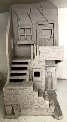 this is an image of a house made out of clay