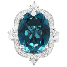 12.75 Carats Natural Impressive London Blue Topaz and Diamond 14K White Gold Ring Total Natural London Blue Topaz Weight: Approx. 12.00 Carats London Blue Topaz Measures: Approx. 15 x 11mm Natural Round Diamonds Weight: .75 Carats (color G-H / Clarity SI1-SI2) Ring size: 7 (we offer free re-sizing upon request) Ring total weight: 9.0 grams SKU #557 London Blue Topaz Ring, Gold Cocktail Ring, Etsy Gold Ring, Rings Diamond, Pink Topaz, Star Jewelry, 14k White Gold Ring, White Gold Ring, Diamond Jewellery