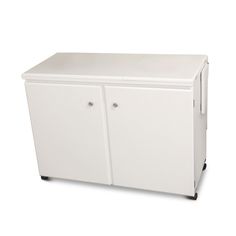 a white refrigerator freezer sitting on top of a counter