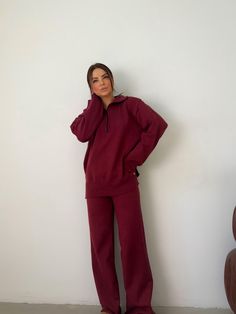 This luxurious two-piece knit set in a rich burgundy shade offers both comfort and style. Perfect for lounging at home or stepping out in casual chic, this outfit features a cozy zip-up sweater and flattering high-waisted pants. The knit fabric provides excellent stretch, ensuring a comfortable fit for various body types. **Measurements (in cm and inches *Sweater:* - Bust (half): 55 cm / 21.65 in - Length: 65 cm / 25.59 in - Sleeve length from the neckline: 70 cm / 27.56 in *Pants:* - Length: 10 Red Winter Sweater For Loungewear, Fall Long Sleeve Tracksuit For Lounging, Red Tracksuit For Fall Loungewear, Red Tracksuit For Loungewear In Fall, Red Winter Sleepwear Long Pants, Red Long Sleeve Tracksuit For Loungewear, Red Long Sleeve Relaxed Fit Sleepwear, Red V-neck Loungewear Set, Cotton Yarn Knitting