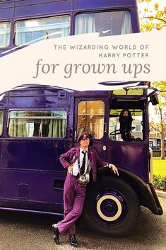 a man standing next to a purple bus with the words for grown ups on it