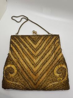 Beautiful vintage evening bag purse. Beaded design. Gold Sequined Shoulder Bag For Evening, Vintage Embellished Rectangular Bag, Rectangular Evening Bags With Gold Beads, Vintage Beaded Shoulder Bag For Party, Vintage Rectangular Evening Bag For Party, Vintage Embellished Rectangular Shoulder Bag, Vintage Handheld Evening Bag For Party, Vintage Evening Bag With Gold Beads, Vintage Beaded Clutch Bag