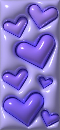 purple hearts are arranged in the shape of heart shapes