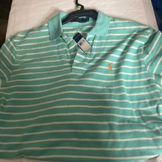 Light Green Striped Polo Shirt With Logo. The Pit Is Approximately 21 Inches And The Length Is Approximately 33 Inches Striped Polo Collar Top For Spring, Striped Shirt With Polo Collar For Spring, Polo Shirt Colors, Ralph Lauren Polo Shirt, Ralph Lauren Polo Shirts, The Pit, Striped Polo Shirt, Ralph Lauren Polo, Ralph Lauren Shirt