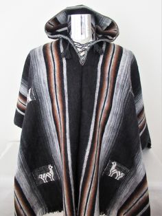 This Poncho is absolutely beautiful and warm, perfect for the winter and autumn seasons because its fiber is highly warm. Its softness and lightness make it a unique garment. Material: Alpaca blend Measurements: 72 X 50 inches Will fit people sizes ranging from medium to large. Weight: 2 pounds Made in Peru Fit People, Hooded Poncho, Long Socks, Boots Outfit, Mitten Gloves, Leg Warmers, Ponchos, Fall Season, Llama