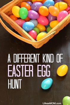 an easter basket filled with colorful eggs on top of a wooden table next to other colored eggs