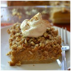 a piece of pie on a plate with a fork