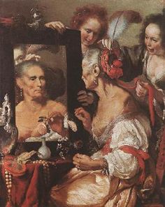 an old woman looking at herself in the mirror with two other women standing around her