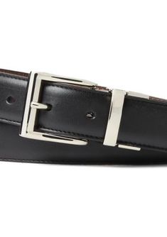 This sleek leather belt from Polo Ralph Lauren reverses from black to brown to easily coordinate with any dressy look. This refined style is finished with a gleaming metal buckle and keeper. 1" wide Single-prong metal buckle Single metal keeper Tapered square tip Signature Pony engraved at the buckle | Polo Ralph Lauren Men's Reversible Leather Dress Belt, 34 Elegant Black Belts And Suspenders For Business, Elegant Brown Belt Buckles For Formal Wear, Elegant Black Leather Belts And Suspenders, Sleek Leather Belts For Office, Sleek Leather Office Belt, Elegant Black Business Belt, Elegant Black Belt For Business, Elegant Brown Belt For Formal Occasions, Elegant Brown Formal Belt