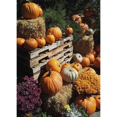 pumpkins and hay stacked on top of each other with the words happy thanksgiving america