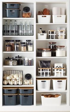 an organized pantry with baskets and containers